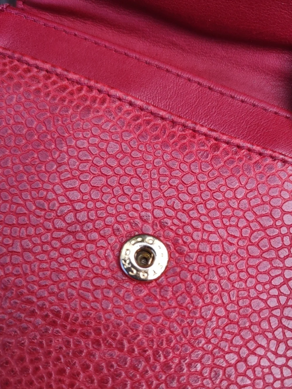 CHANEL Red Quilted CC Embossed Leather Coin Wallet.